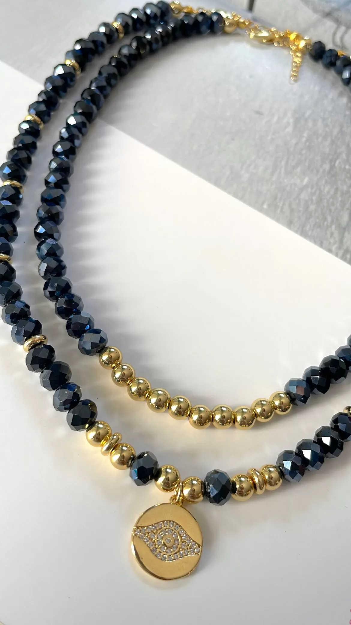 Crystals and gold plated beads necklaces