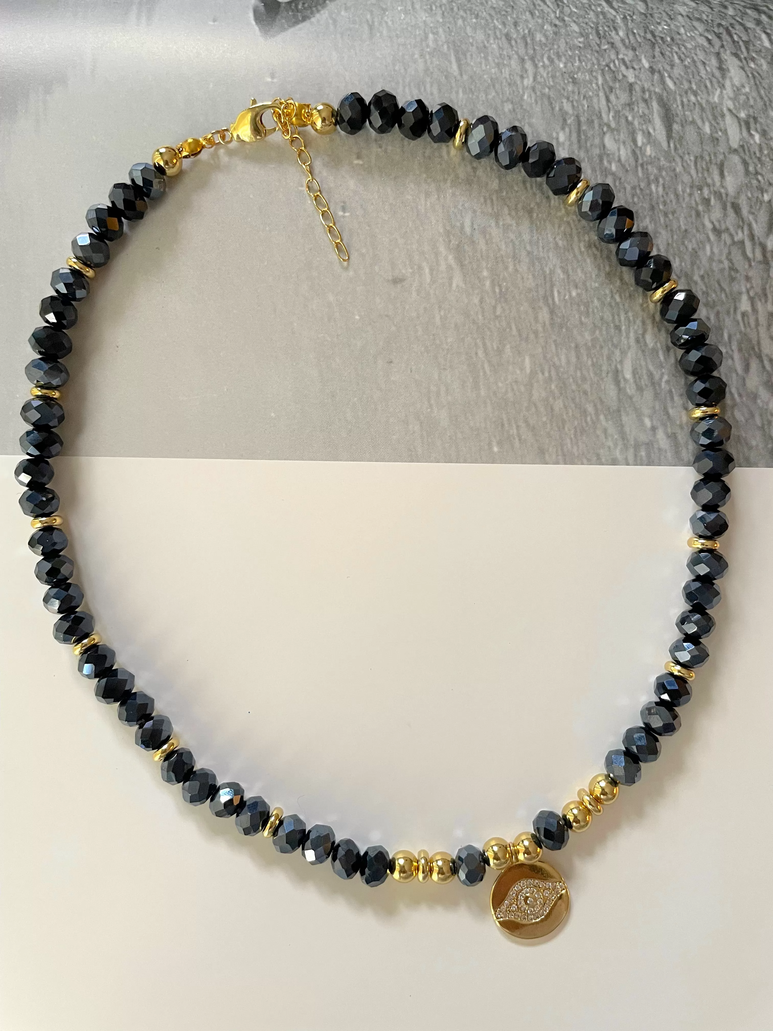 Crystals and gold plated beads necklaces