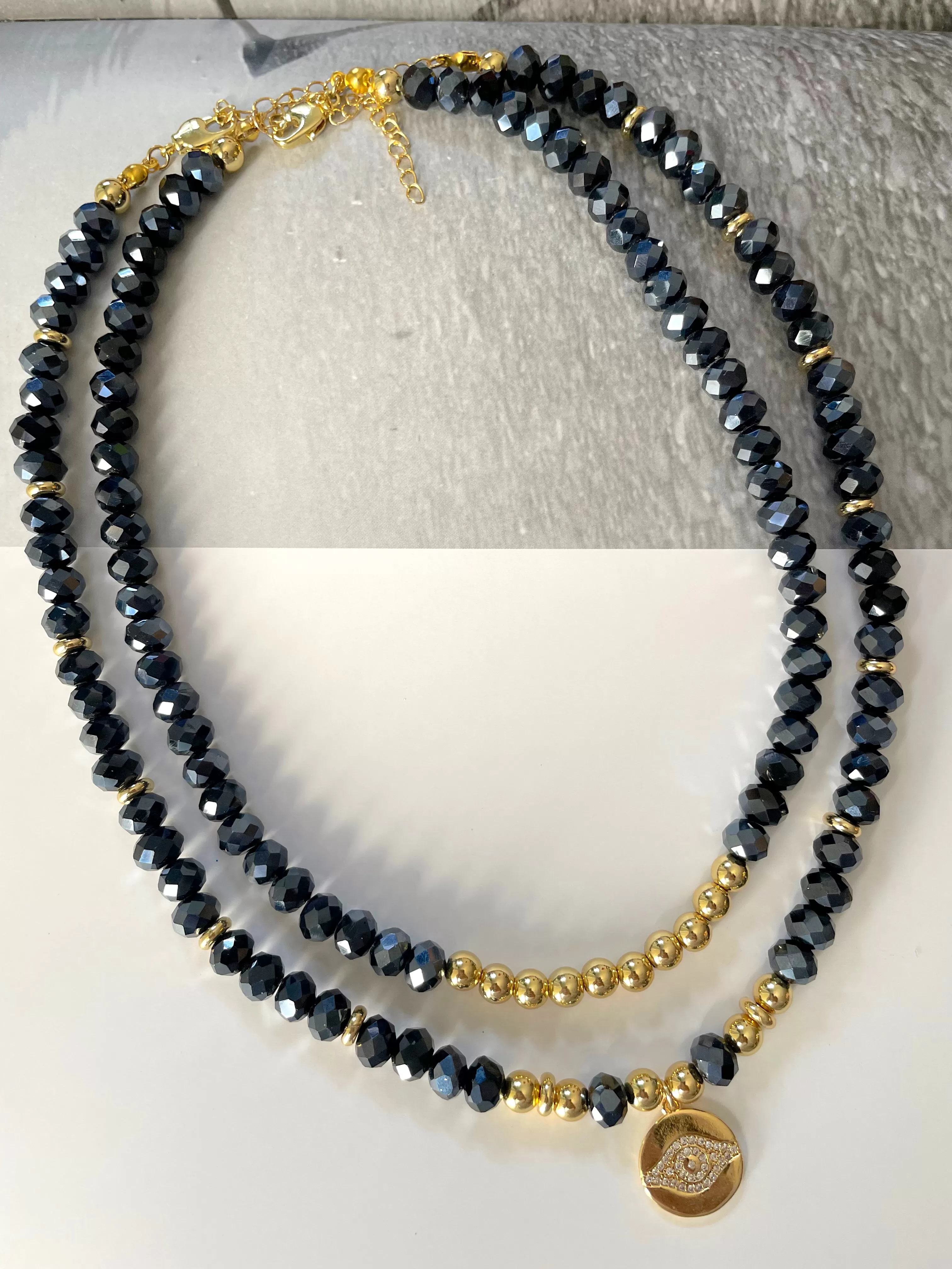 Crystals and gold plated beads necklaces